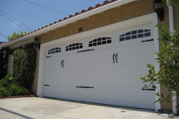 Sectional steel garage door