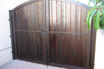 Manual double swing gates with Redwood cover.