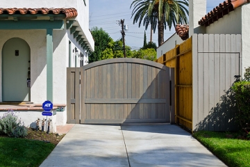 Swing driveway gate, Redwood cover. 